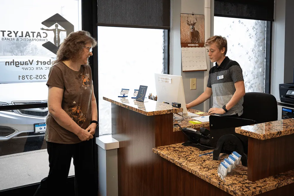 Patient checking in at the front desk