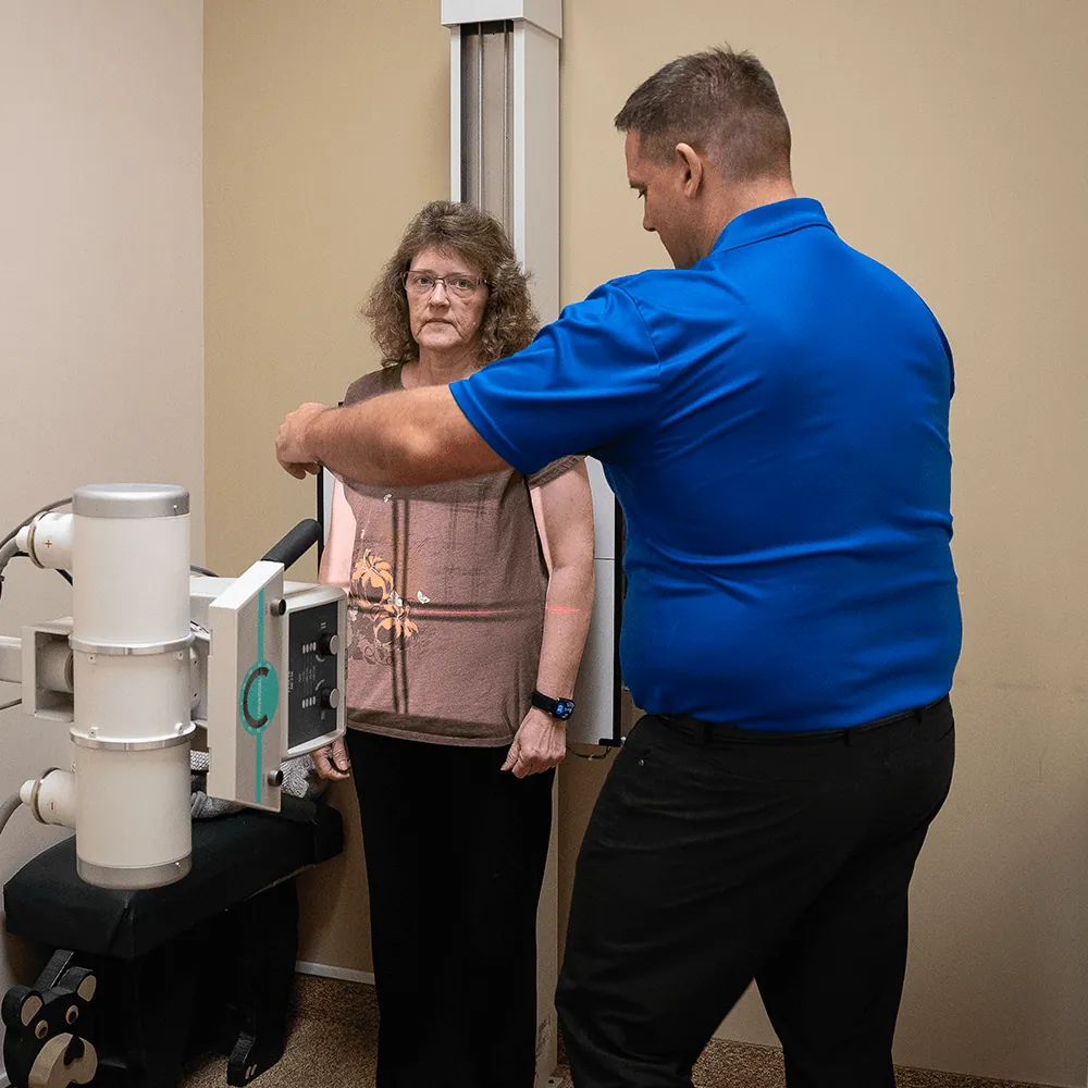 Patient positioned for a spine x-ray