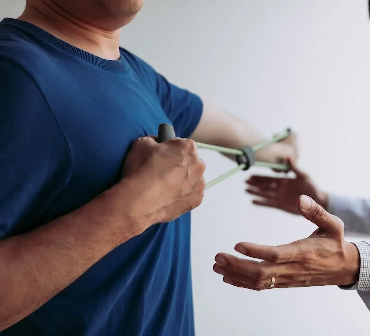 man having a physical therapy session
