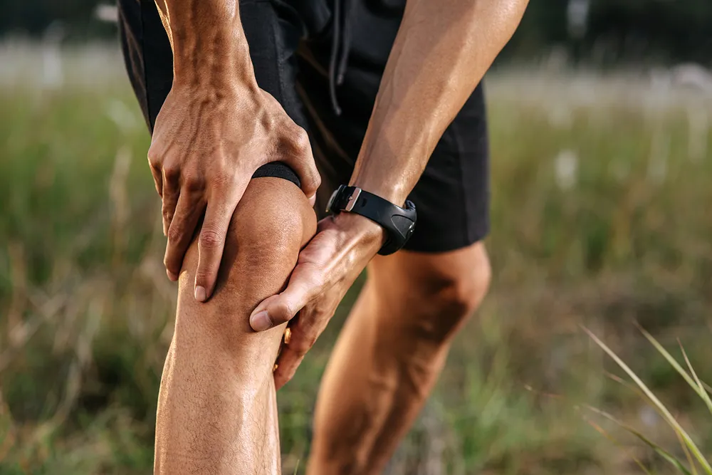 athlete man suffer knee pain