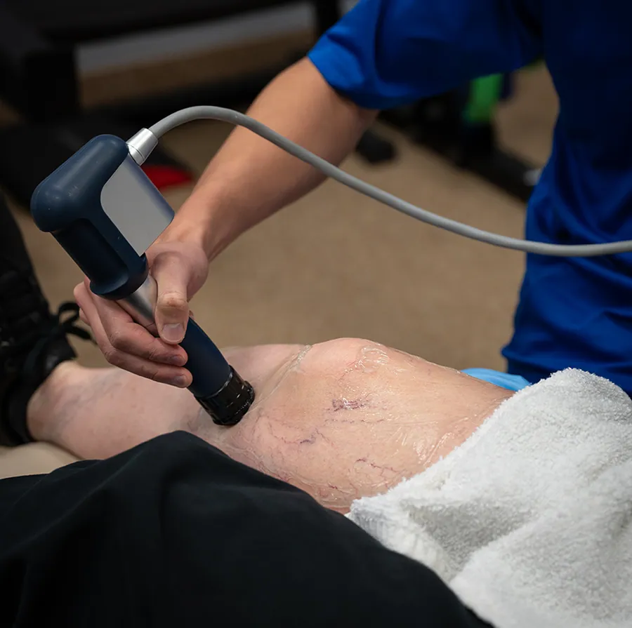Close-up of shockwave therapy treatment